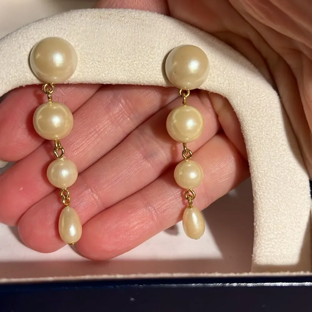 Faux pearl dangle pierced earrings.